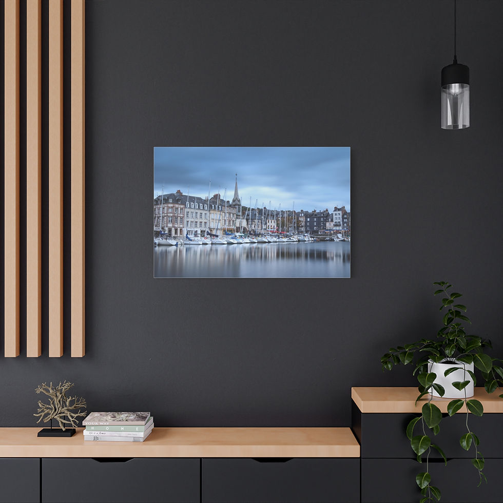Thumbnail: Moody wall art: historic harbor town with boats, church spire.