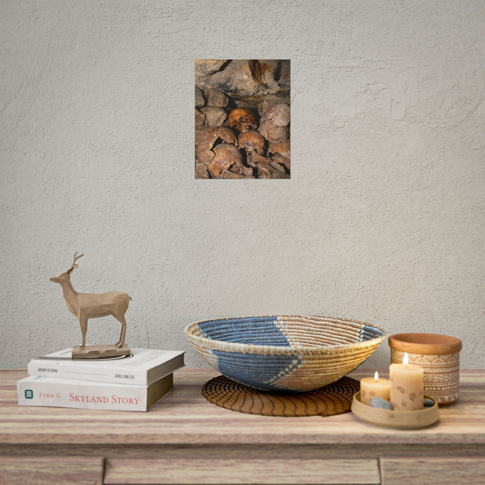 Thumbnail: Framed print of dark, mysterious, earthy cave passage above decorative console.
