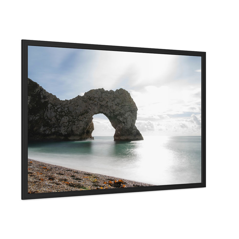 Thumbnail: Durdle Door natural rock arch by calm sea under bright sky.