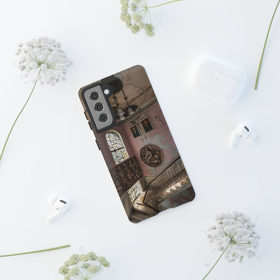 Thumbnail: Smartphone with vintage architectural building case, surrounded by flowers and earbuds.