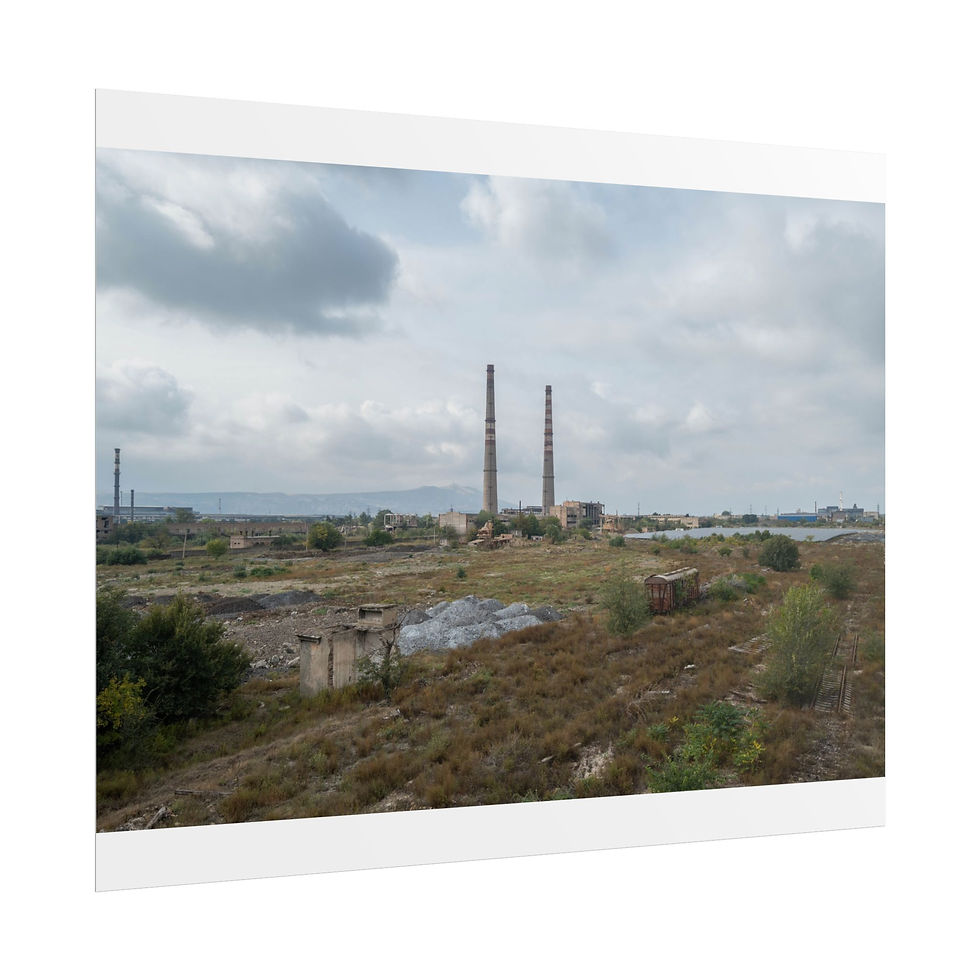 Thumbnail: Former industrial power plant with twin chimneys and desolate landscape.