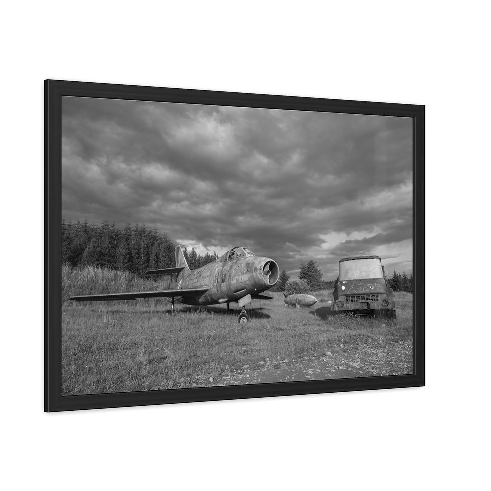 Thumbnail: Dilapidated airplane and abandoned van under a dramatic cloudy sky.
