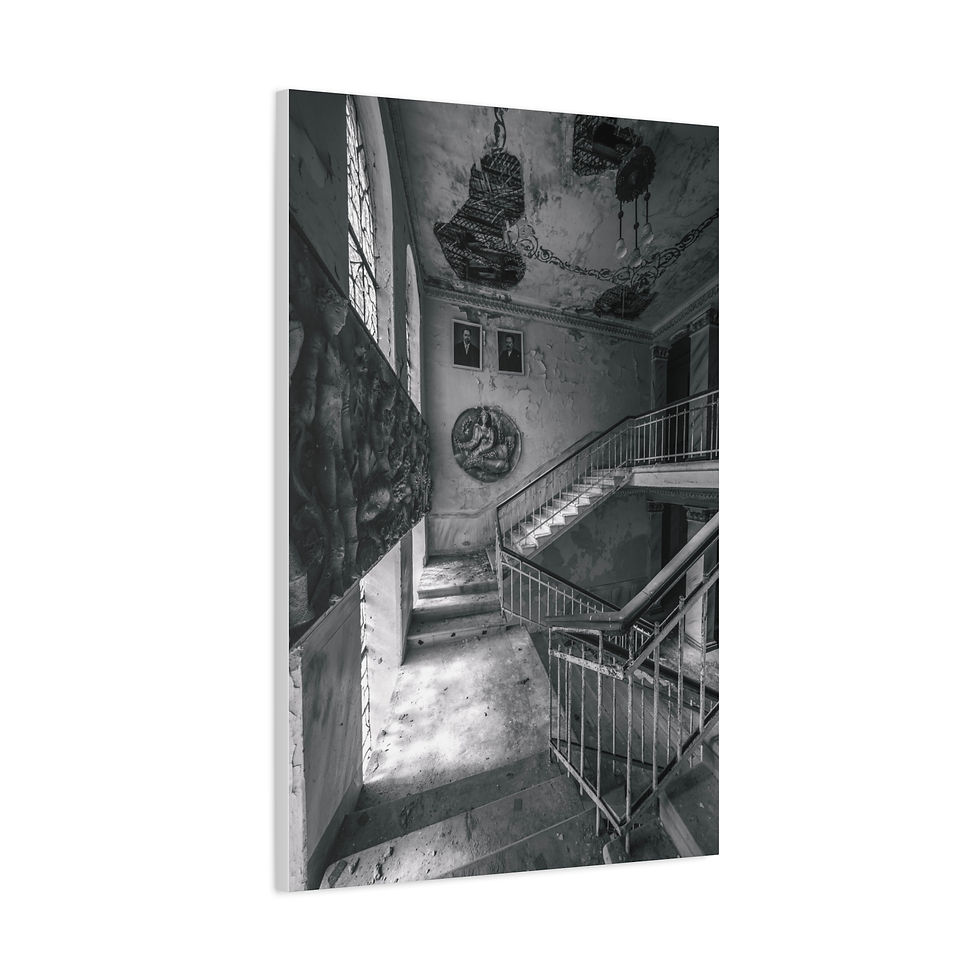 Thumbnail: Grayscale image of a dilapidated, abandoned building interior with grand staircase.