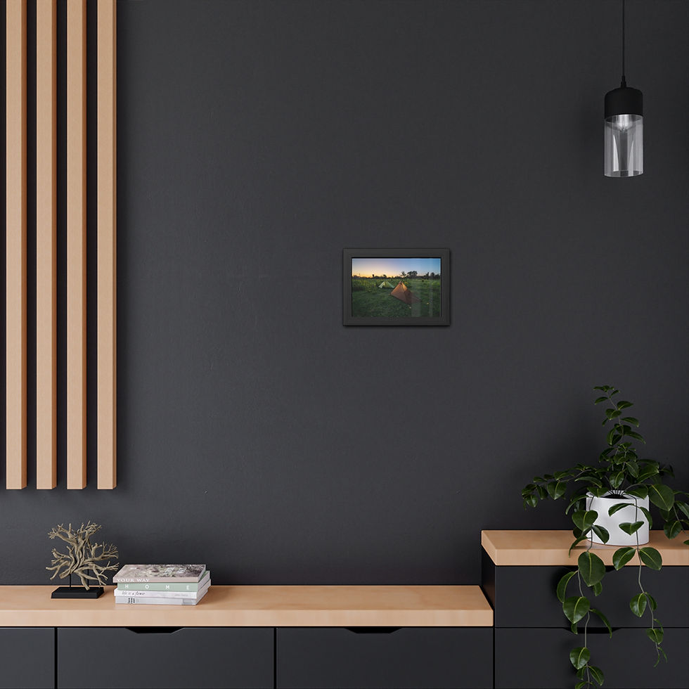 Thumbnail: Small framed landscape art centered on dark wall over wood console.