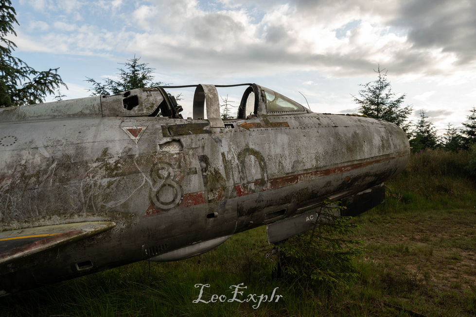 Up close of the side of an abandoned Dassault Mystere bomber.