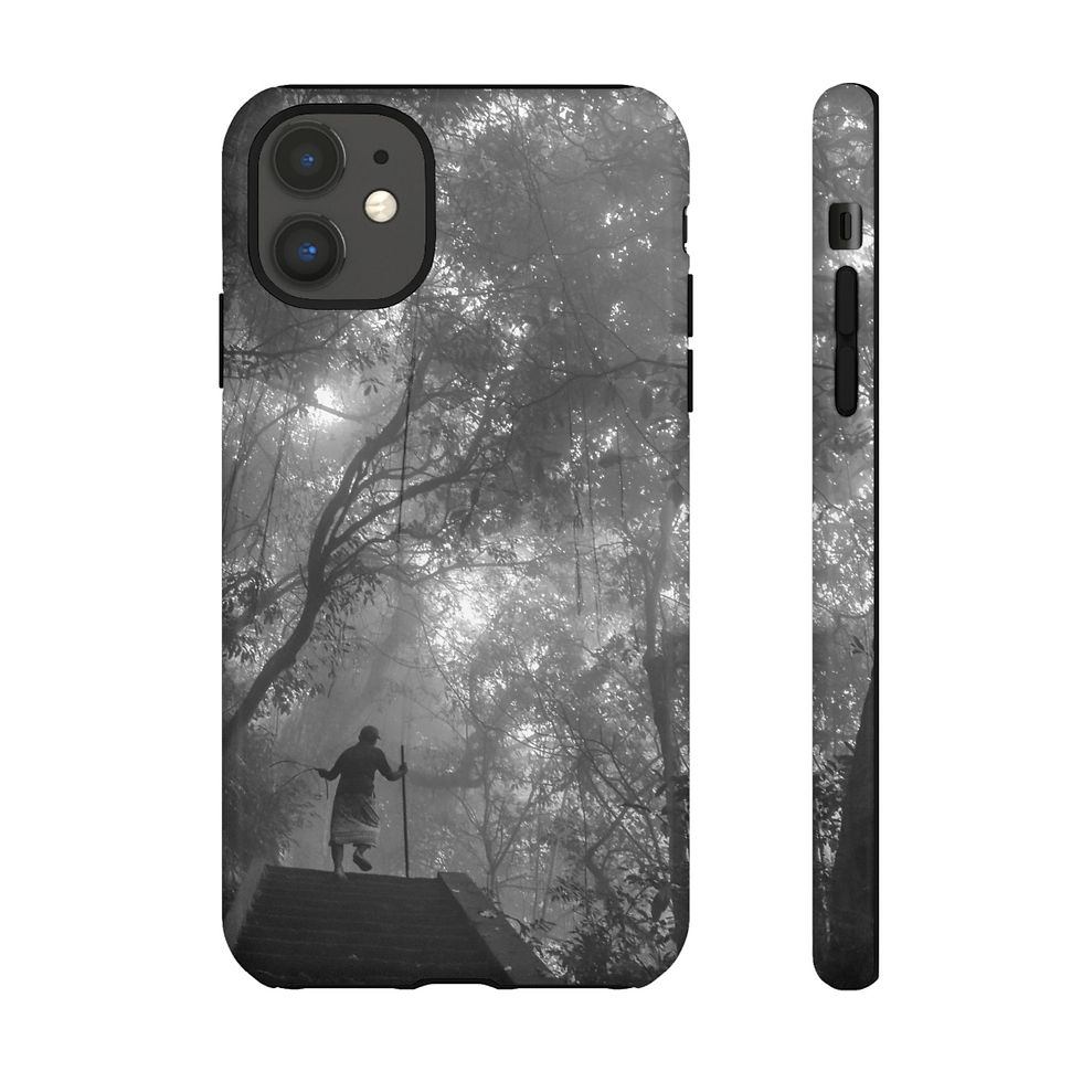 Thumbnail: Monochrome phone case, person in misty forest, light piercing through trees.