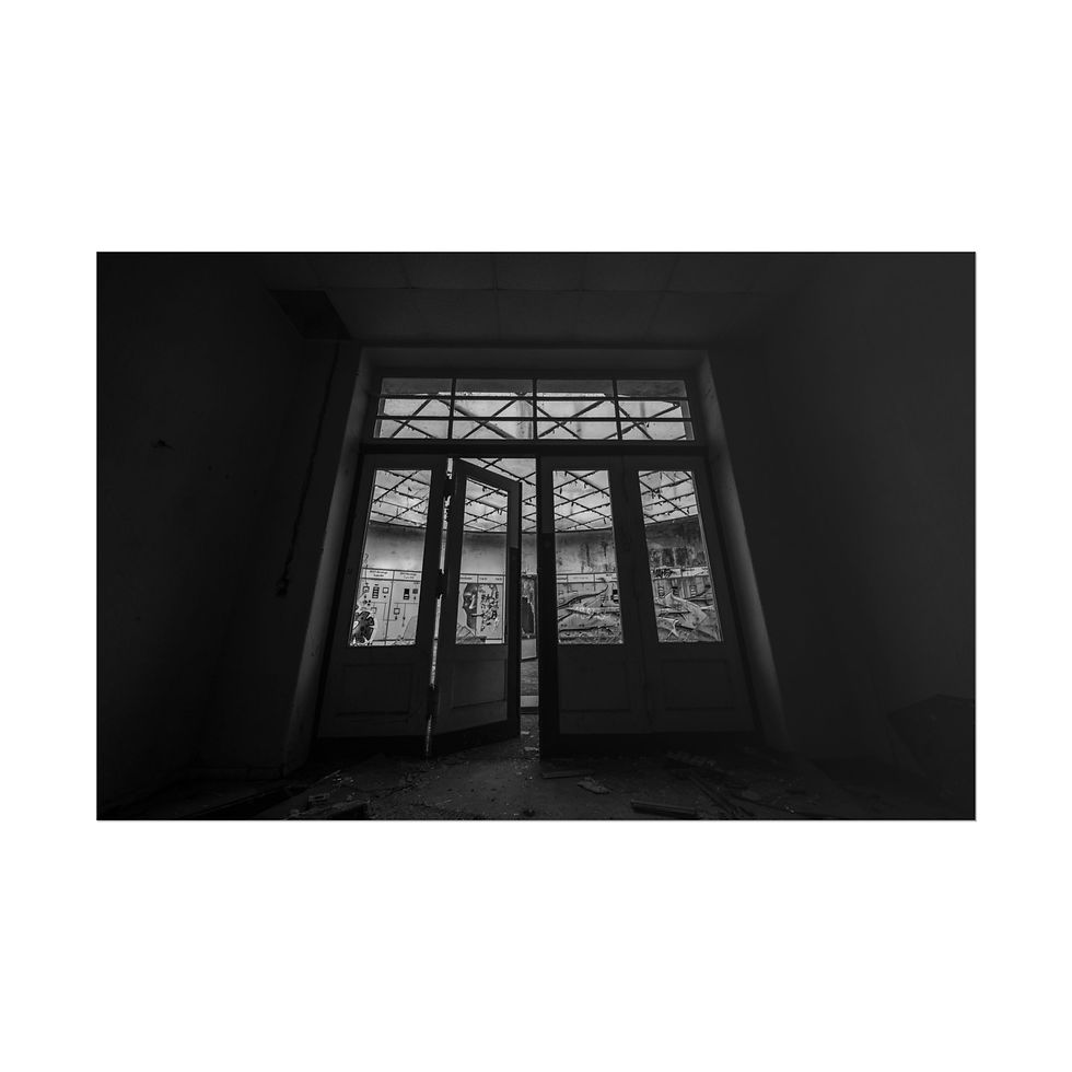 Thumbnail: Dark room, open ornate glass doors revealing light outside.