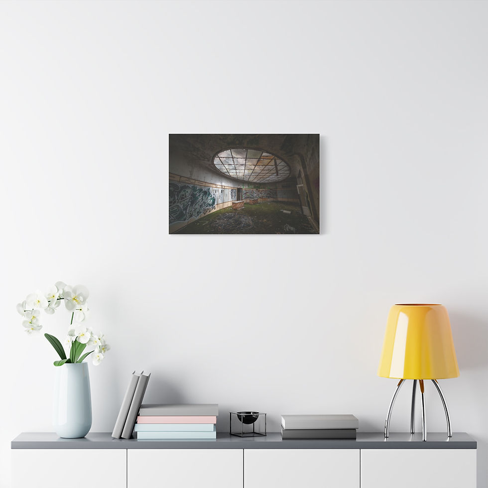 Thumbnail: Canvas print: abandoned graffiti-covered building interior, circular skylight, person standing.