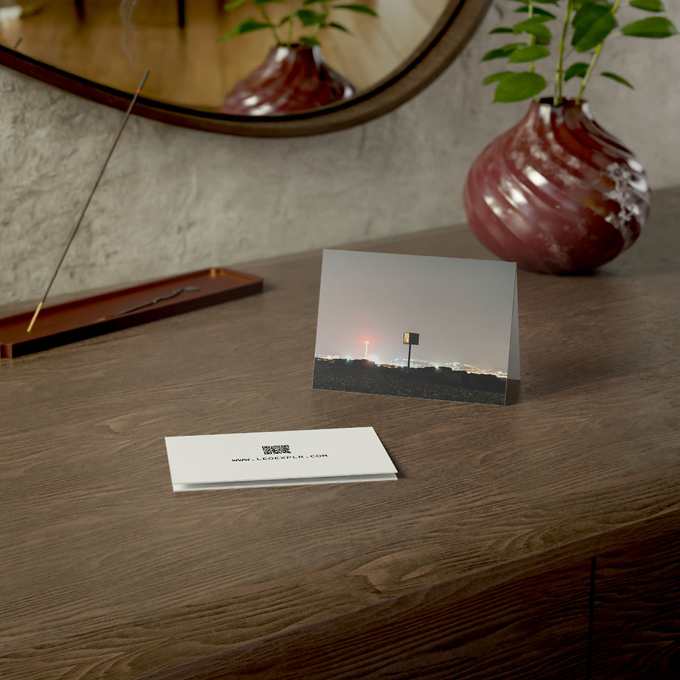 Thumbnail: Folded greeting card with landscape image, incense, vase, on wooden dresser.