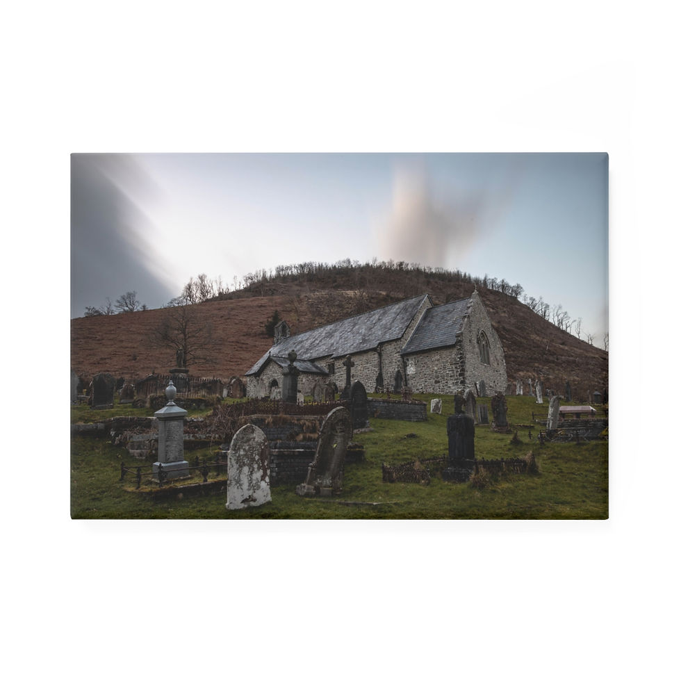 Thumbnail: Ancient stone church and gravestones on a hillside under hazy sky.