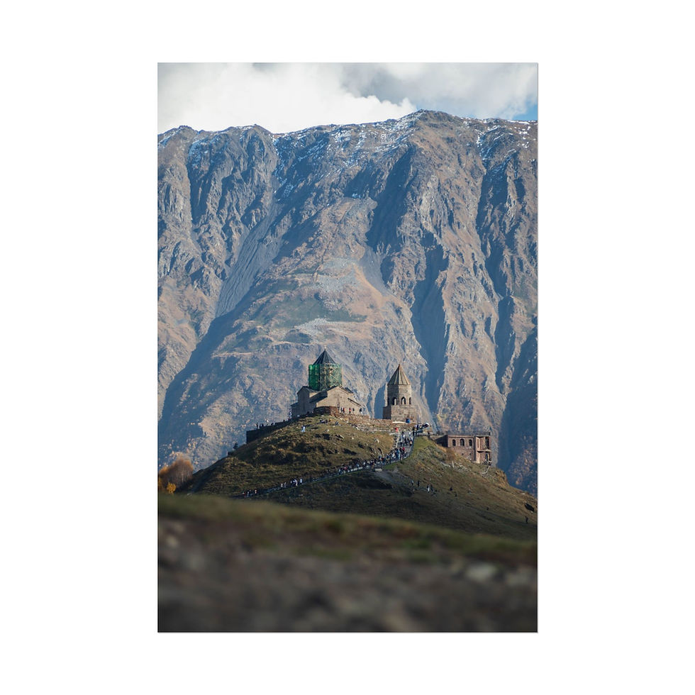 Thumbnail: Ancient church on a hill with a massive, rugged mountain background.