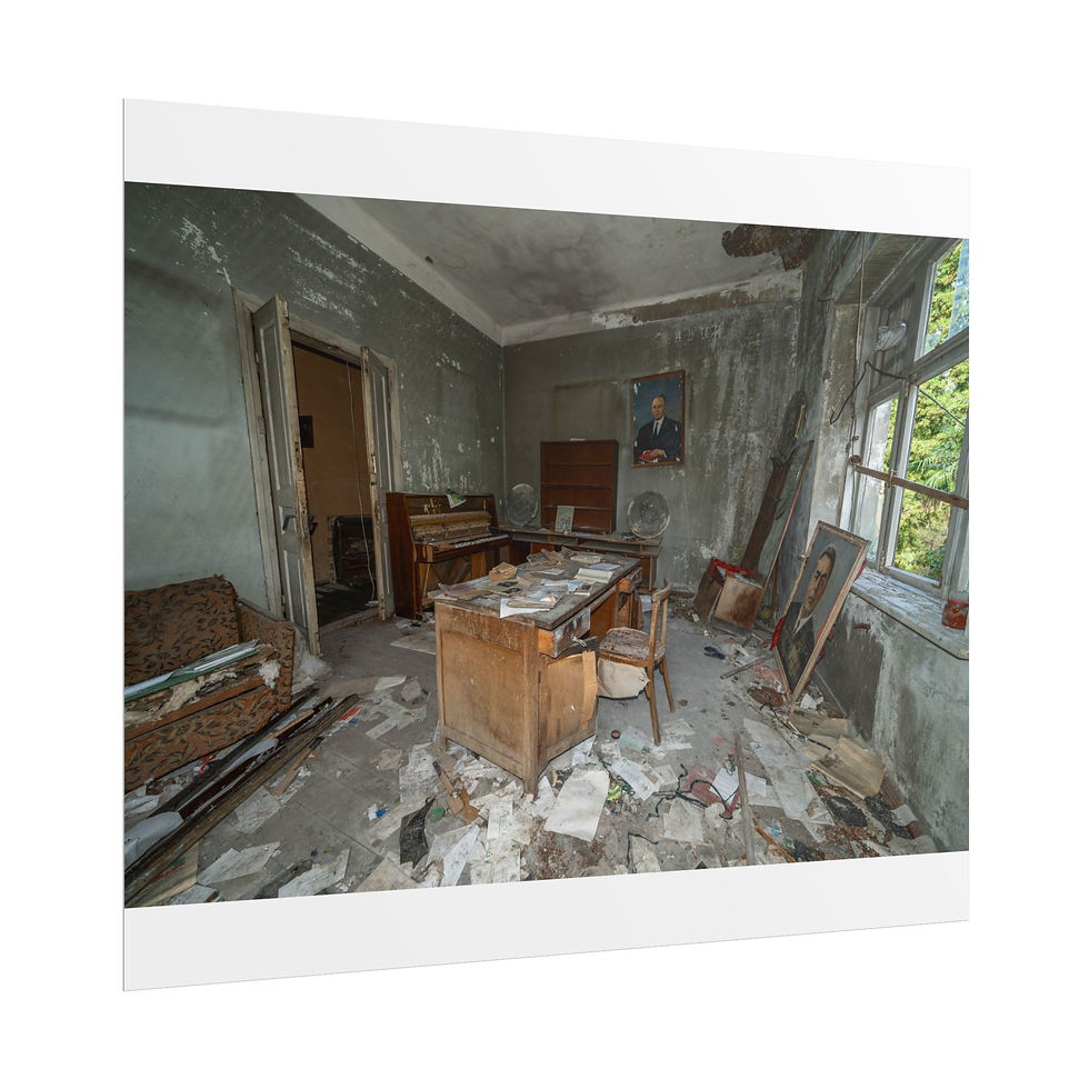 Thumbnail: Abandoned, decaying office room with desk, chair, and debris.