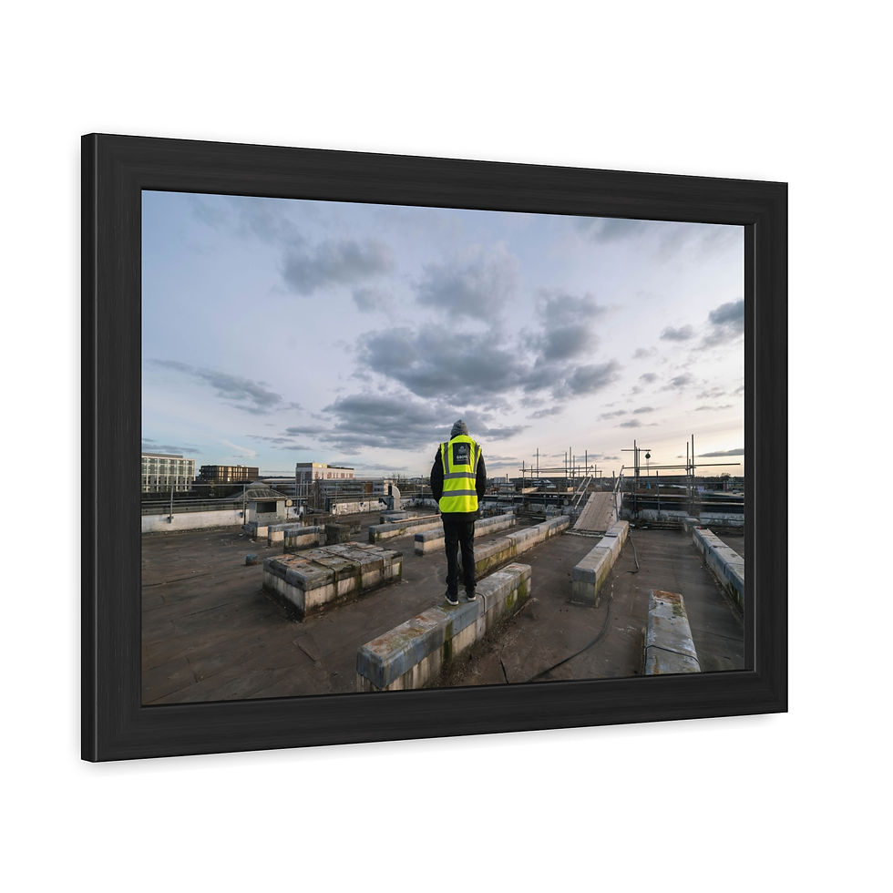 Thumbnail: Person in hi-vis vest on concrete rooftop under cloudy sky.
