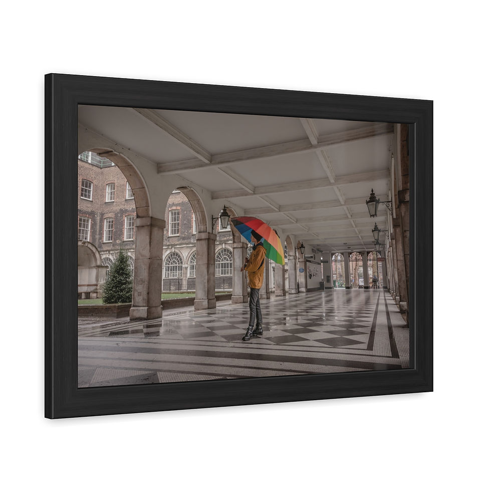 Thumbnail: Person with rainbow umbrella under grand arches, London architecture.