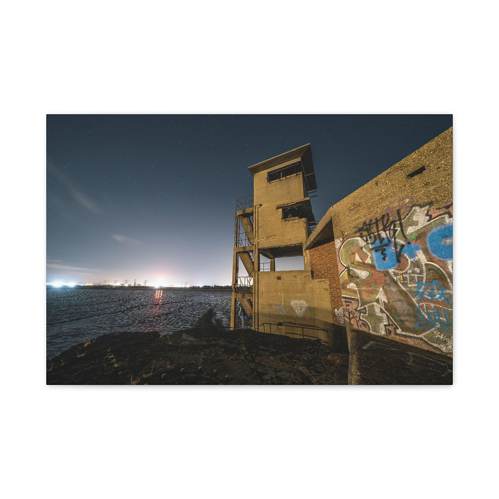 Thumbnail: Abandoned concrete building with vibrant graffiti under a dark night sky.