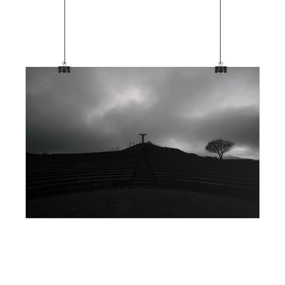 Thumbnail: Solitary figure with outstretched arms on dark hill under stormy sky.