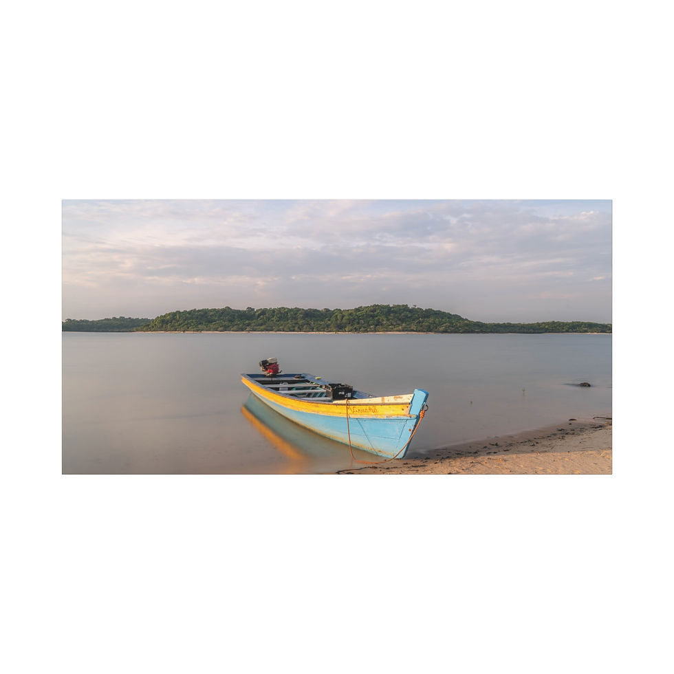 Thumbnail: Colorful fishing boat resting on a sandy shore by calm water, under cloudy sky.