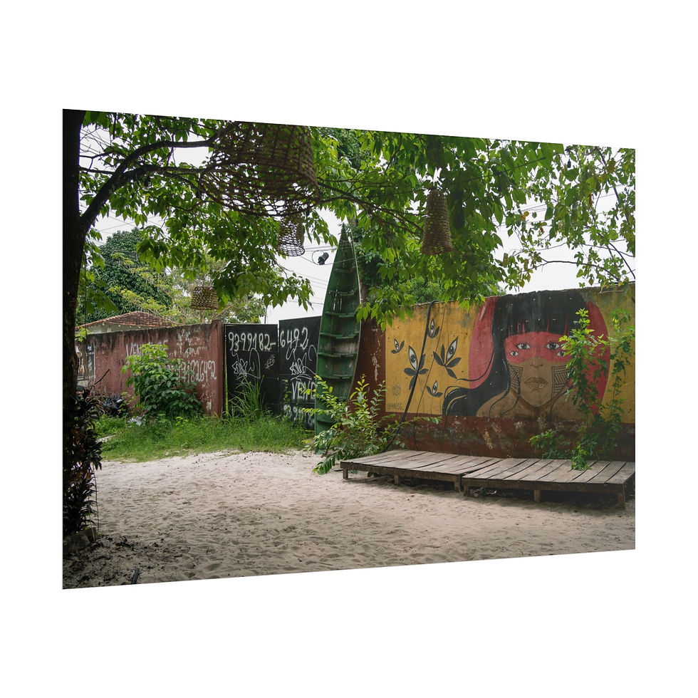 Thumbnail: Courtyard with vibrant graffiti featuring face, sandy ground, and wooden platform.
