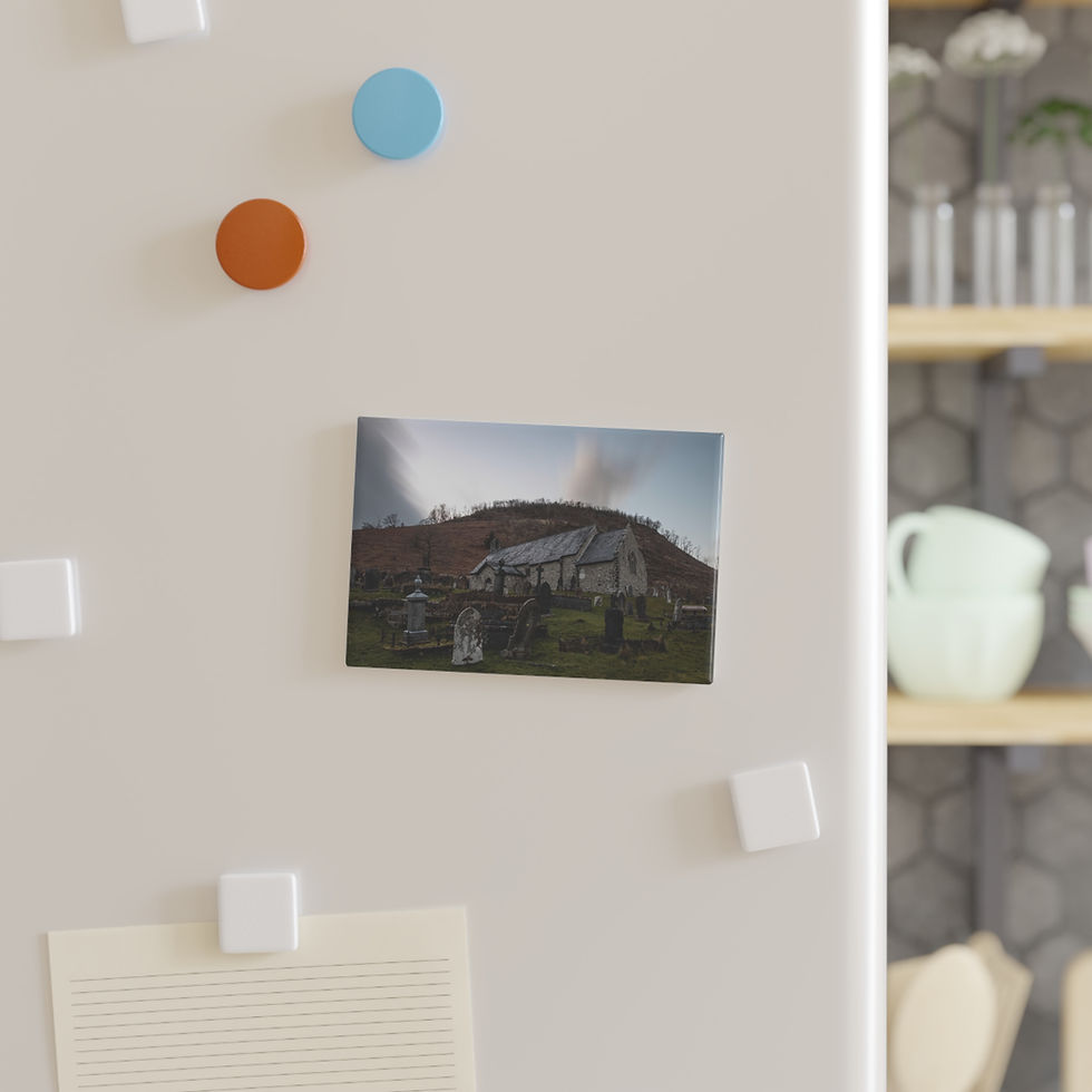 Thumbnail: Refrigerator magnet showing rural house by a mountain under a cloudy sky.