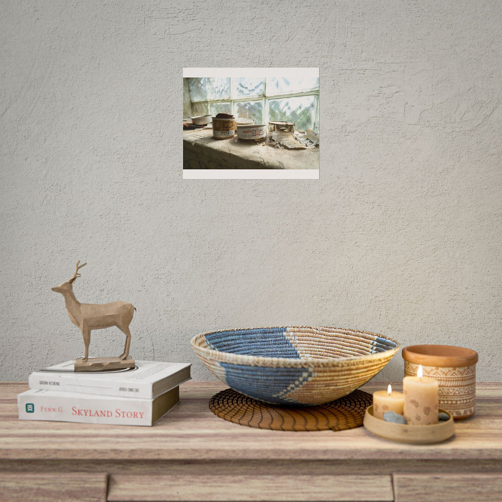 Thumbnail: Stylish shelf with deer statue, books, woven bowl, candles, framed wall art.