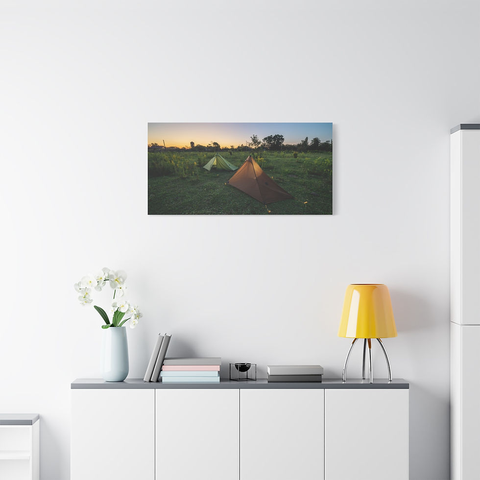 Thumbnail: Framed art of two camping tents in a green field at sunset.