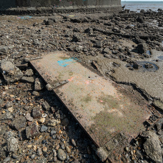 Grain Tower in Isle of Grain - Broken door on the floor of the beach