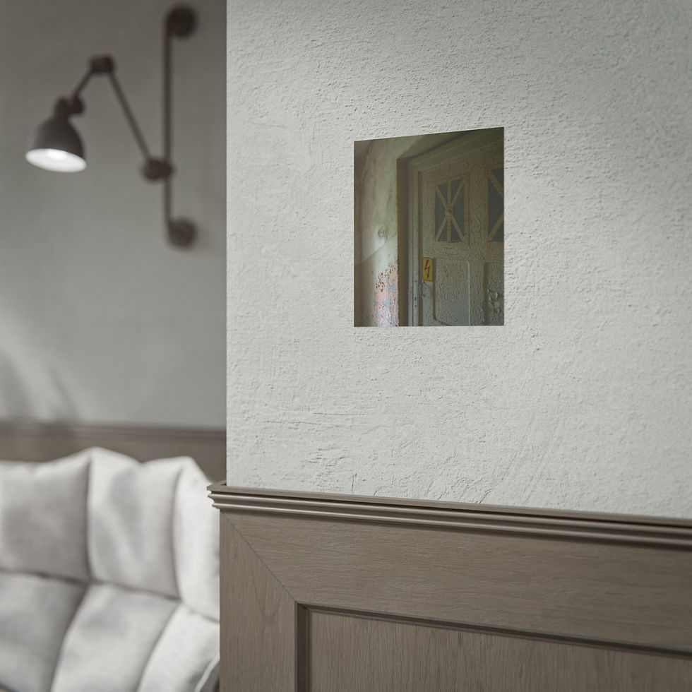Thumbnail: A framed image of a door in a room with wood paneling.