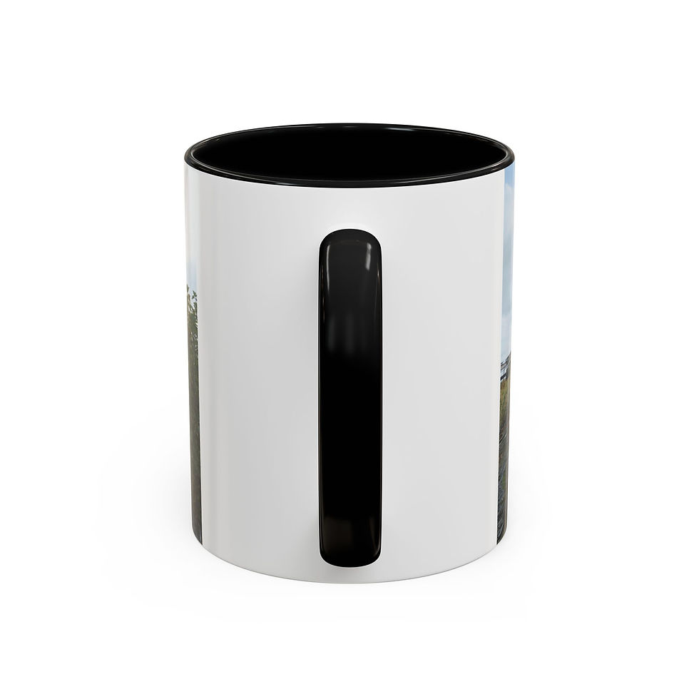 Thumbnail: White ceramic coffee mug with black handle and interior, side view.