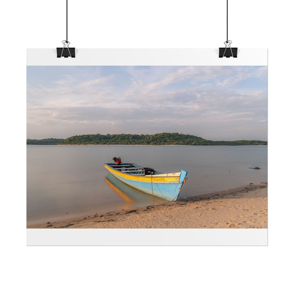 Thumbnail: Colorful blue and yellow boat resting on sandy beach by calm water.