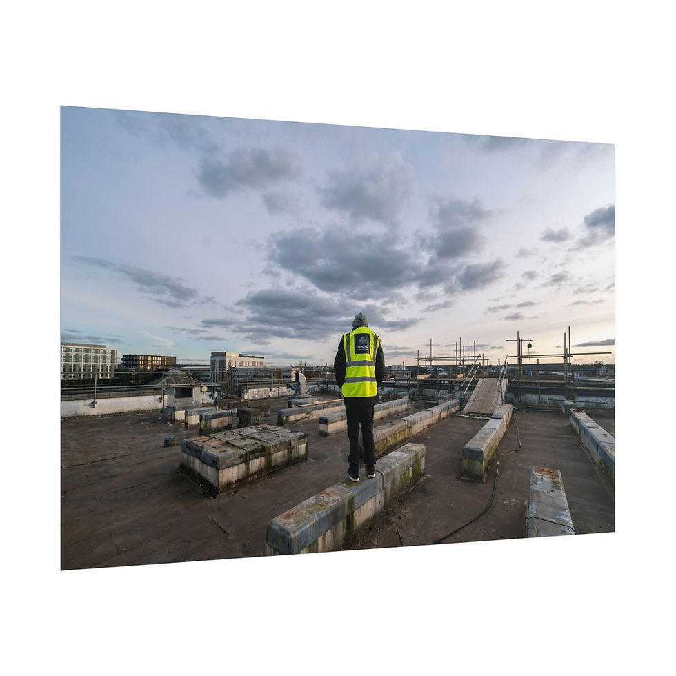 Thumbnail: Individual in reflective vest observes sprawling urban rooftop vista.