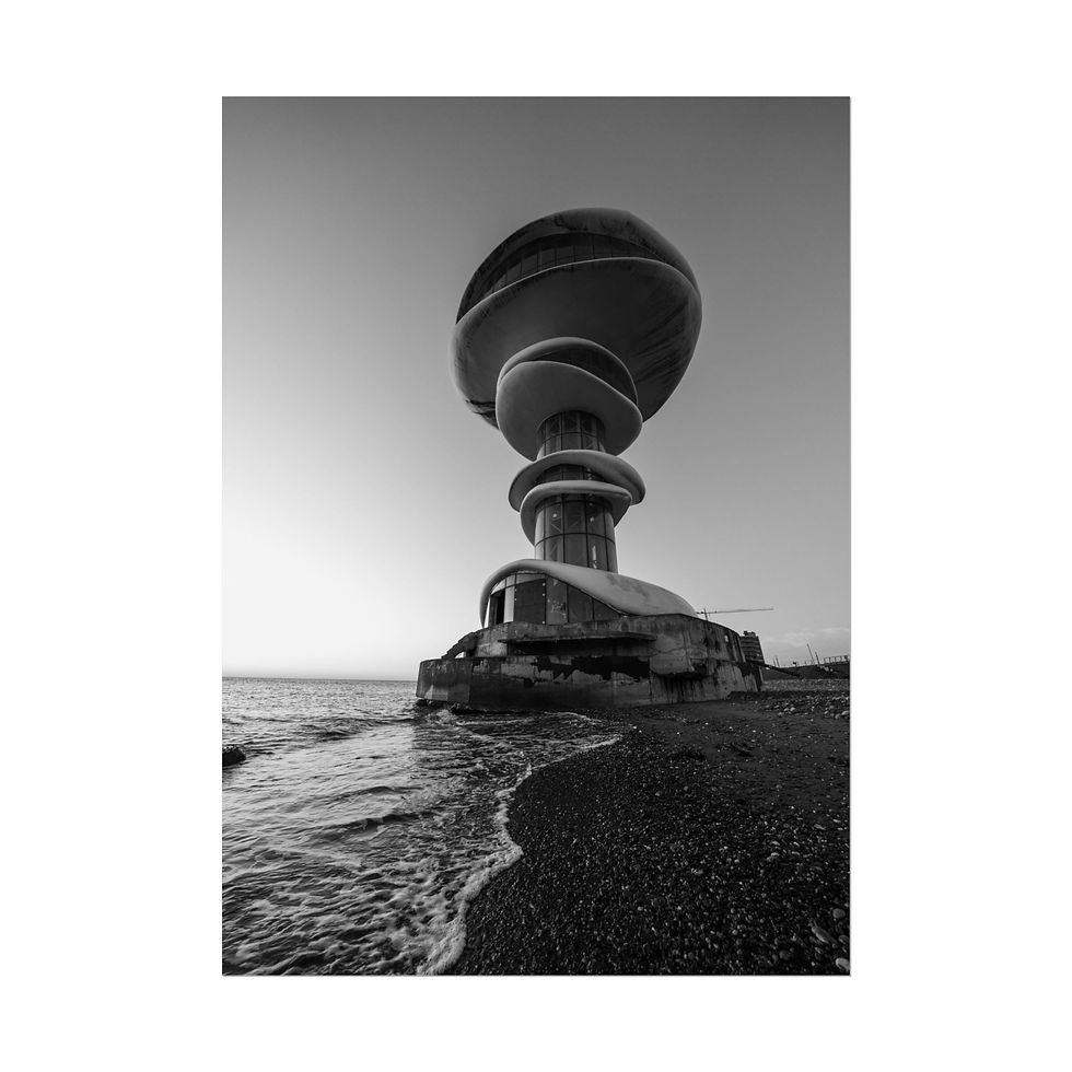 Thumbnail: Black and white abandoned spiraling tower by the Black Sea shore.