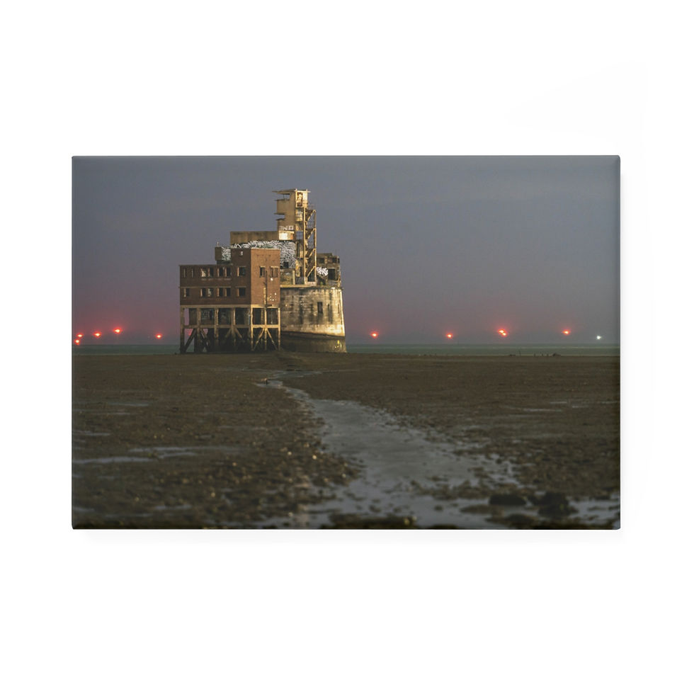 Thumbnail: Dilapidated industrial building on barren land with distant red lights.