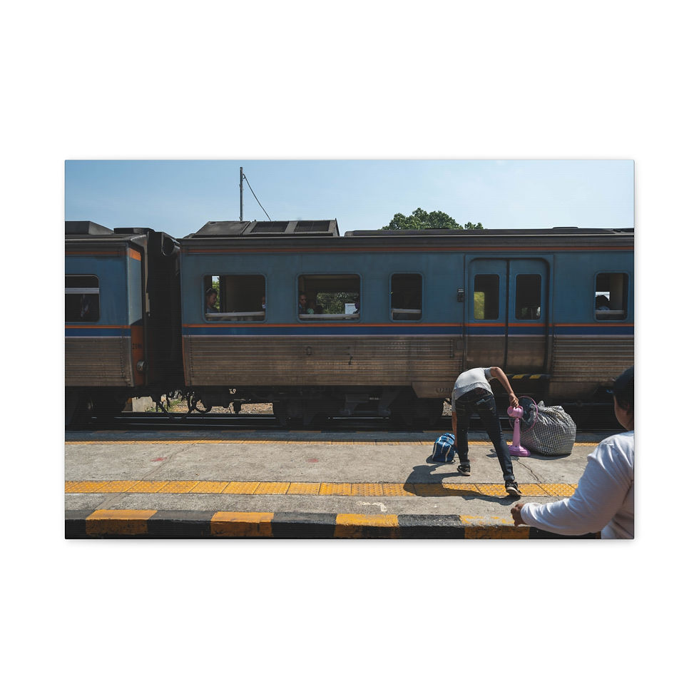 Thumbnail: Travelers on platform next to blue train, preparing to board.