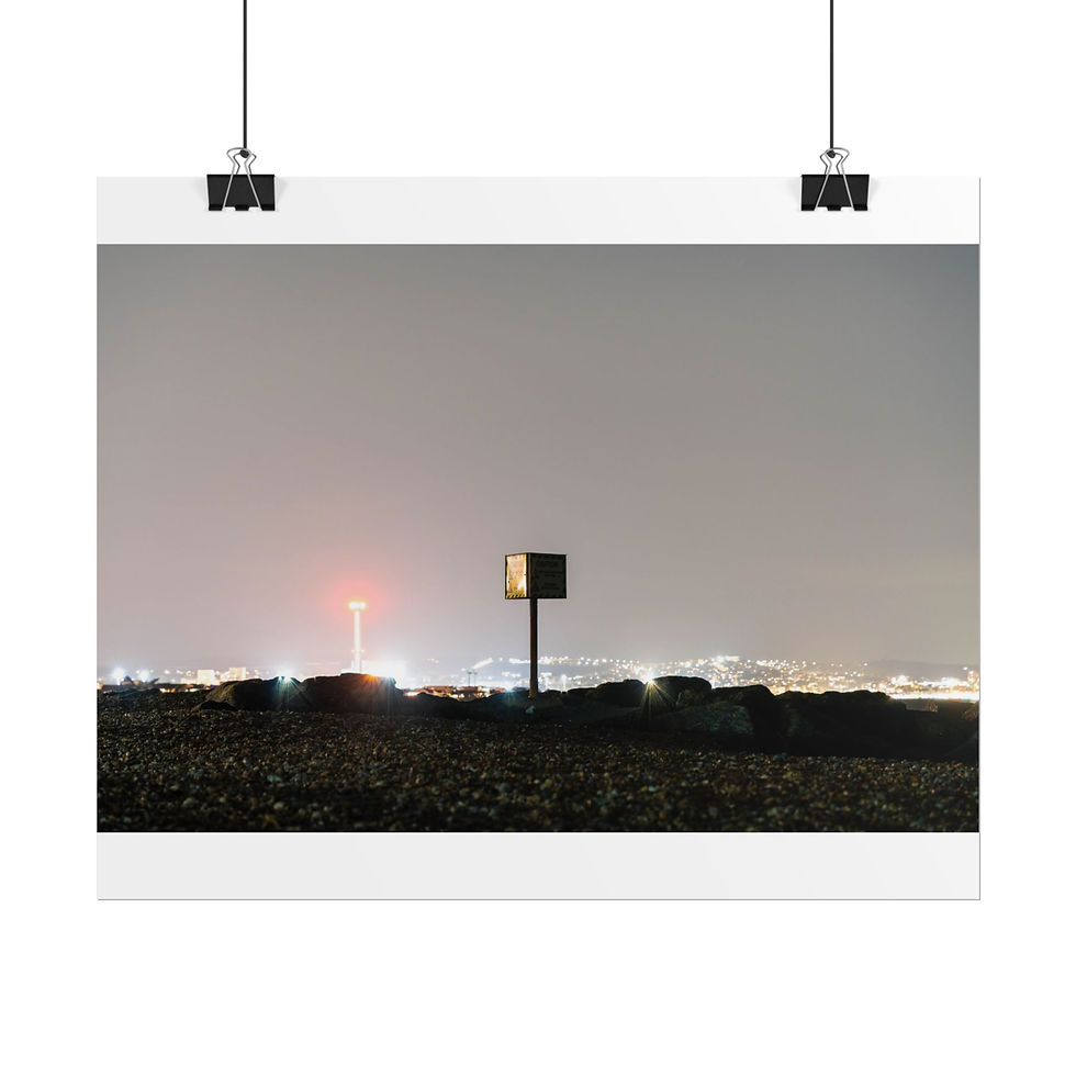 Thumbnail: Dark night landscape with distant city lights and red tower beacon.