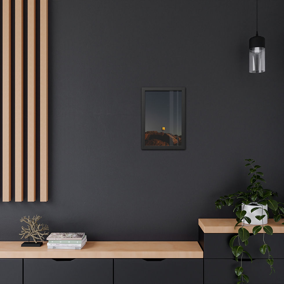 Thumbnail: Framed picture of yellow orb over dark landscape in modern room.
