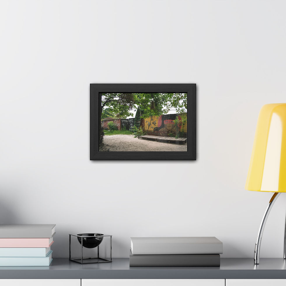 Thumbnail: Framed picture of colorful abandoned building on modern shelf with lamp.