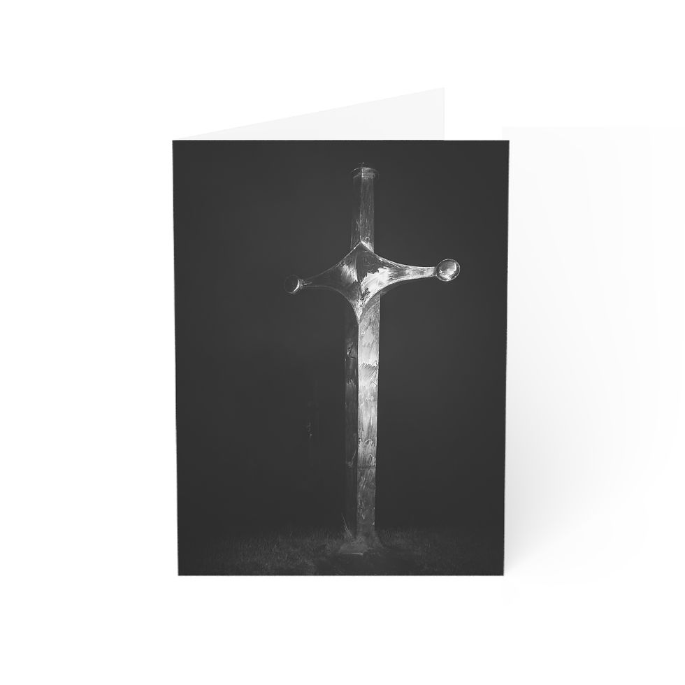 Thumbnail: Greeting card with a grayscale image of a shining sword on dark background.
