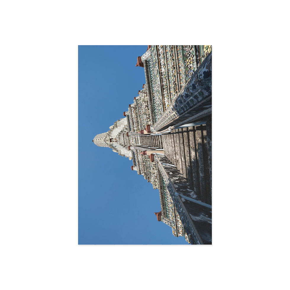 Thumbnail: Tall ornate Gothic cathedral spire against a clear blue sky.
