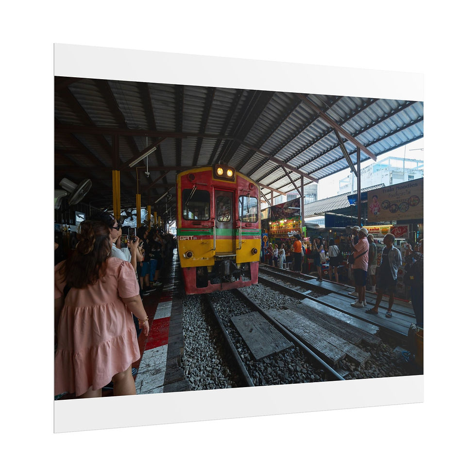 Thumbnail: Red and yellow passenger train at a busy station platform.