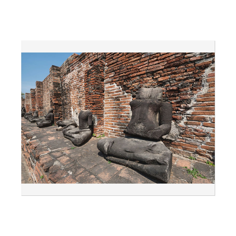 Thumbnail: Ruined Buddha statues against crumbling brick wall in ancient Ayutthaya, Thailand.