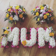 Floral arrangement with the word MUM and two flower bouquets, sympathy flowers, Bentley Blooms
