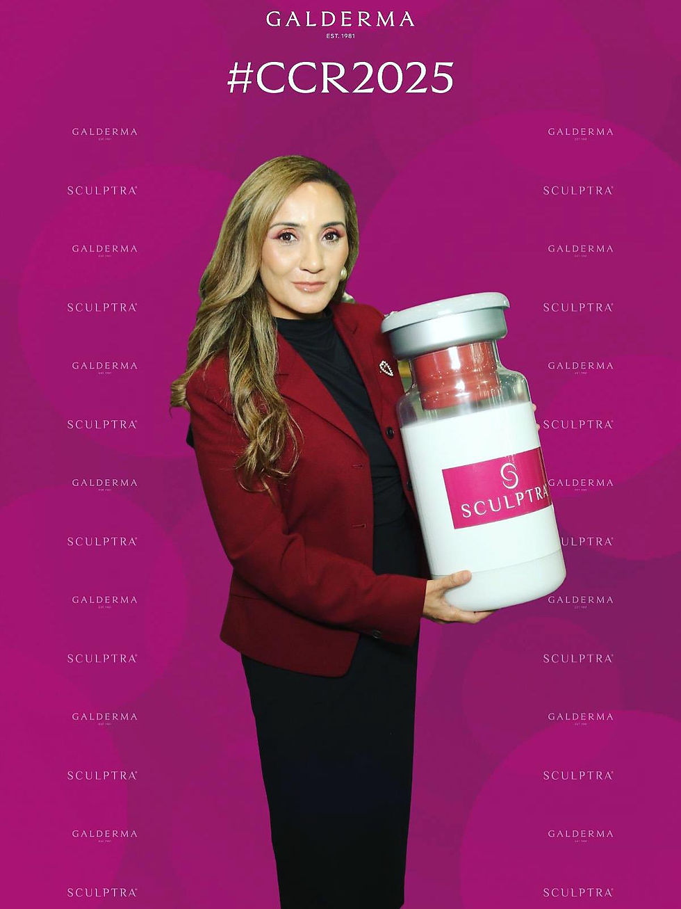 Dr Ayesha Aesthetics holding bottle of Sculptra