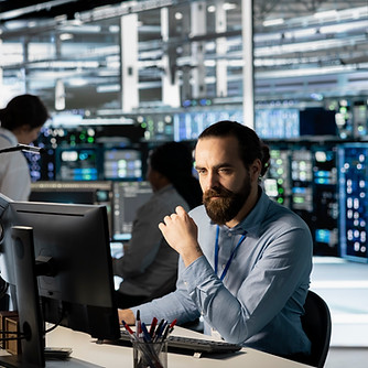 technician-using-pc-data-center-update-server-tech-configuring-equipment.jpg