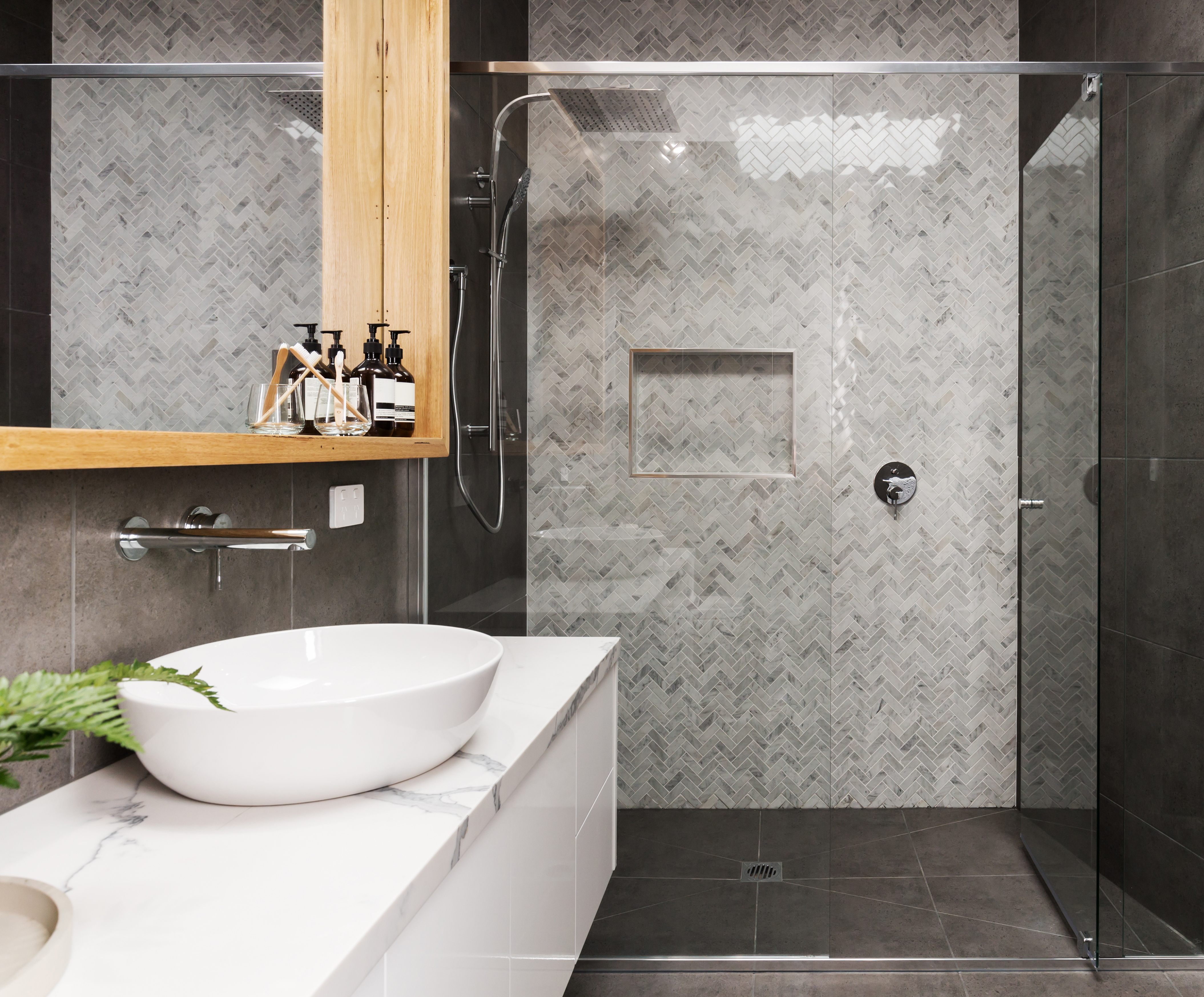 Marble mosaic herringbone tiled shower f