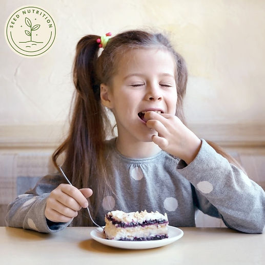 girl eating food without tummy ache