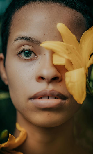 woman with yellow flower