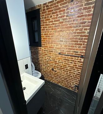 Bathroom Renovation With Exposed Brick