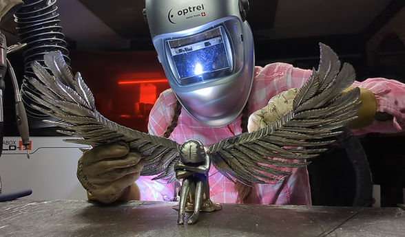 Patience Sad Angel Sculpture Sculptor Barbie The Welder Optrel weld hood.jpg