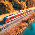 aerial-view-of-red-high-speed-train-moving-near-la-2024-12-05-21-46-34-utc_edited.jpg