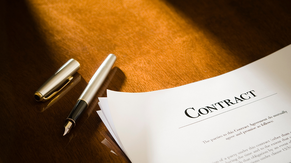 A pen and a draft contract on wooden table